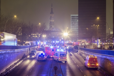 HAMBURG, GERMANY - JANUARY 28: Fire and Rescue Services at a severe car accident with four cars and six injured people, two of them jammed in their cars. 
on January 17, 2013 in Hamburgのeditorial素材