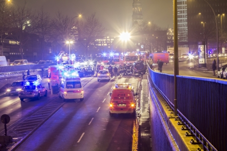 HAMBURG, GERMANY - JANUARY 28: Fire and Rescue Services at a severe car accident with four cars and six injured people, two of them jammed in their cars. 
on January 17, 2013 in Hamburgのeditorial素材