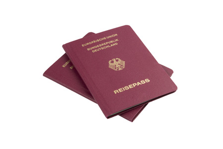 Two german Passports isolated on white backgroundの写真素材