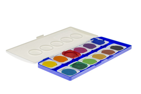 Used Paintbox with some used colours isolated on white の写真素材