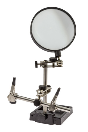 A so called third hand aid device for brazing and assambling small items isolated on white background の写真素材