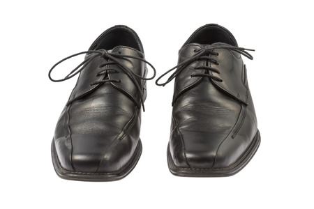 a Pair of Black Leather man Shoes isolated on white backgroundの写真素材