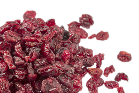 dried cranberries isolated on white backgroundの写真素材
