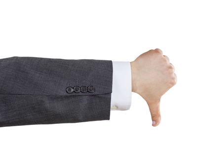 Isolated arm of a business man in suite showing thumb down gesture