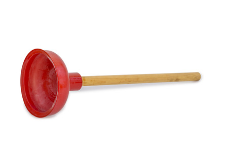 Red rubber plunger with wooden handle isolated on white background with light shaddowの写真素材