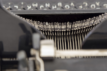 Detail view of the type bars of an old typewriterの写真素材