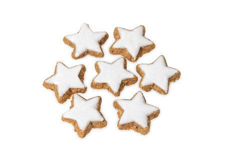 star-shaped cinnamon biscuits isolated on white backgroundの写真素材