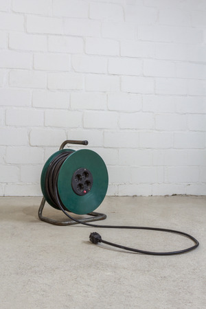 Cable Reel on a concrete floor in the basementの写真素材