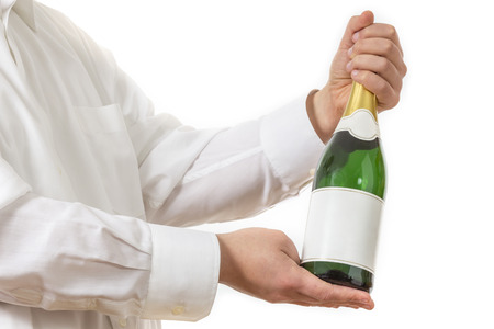 A Waiter in white shirt presenting a Bottle of Champagneの写真素材