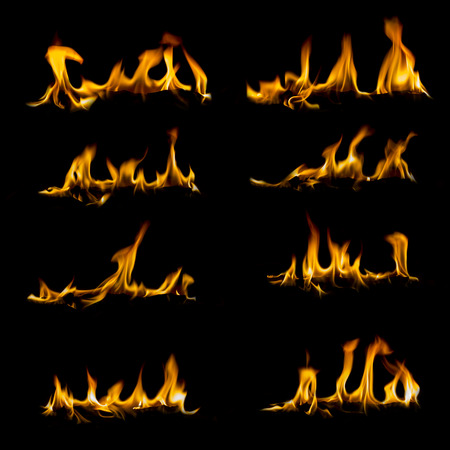 Collection of different types and shapes of flames isolated on black backgroundの写真素材