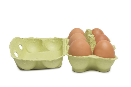 Open Box with six brown eggs isolated on white backgroundの写真素材