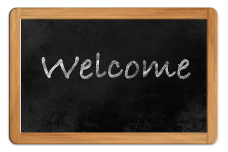 Welcome written on a Blackboard with wooden frame, isolated on white backroundの写真素材