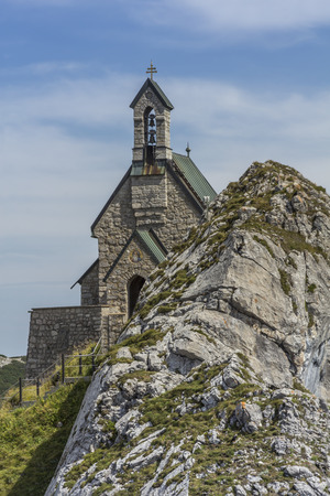 Small chapel on a mountain in the Bavarian alpsの写真素材