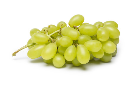 fresh green grapes isolated on white backgroundの写真素材