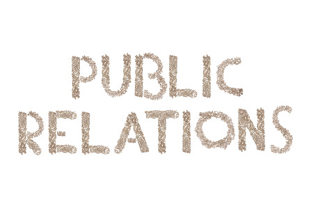 Public Relations written in letters formed with wooden cubes with letters isolated on white backgroundの写真素材