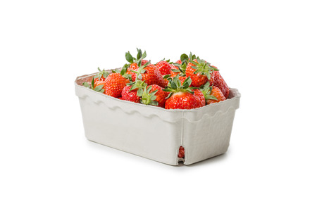Strawberries in a paper bowl isolated on white backgroundの写真素材