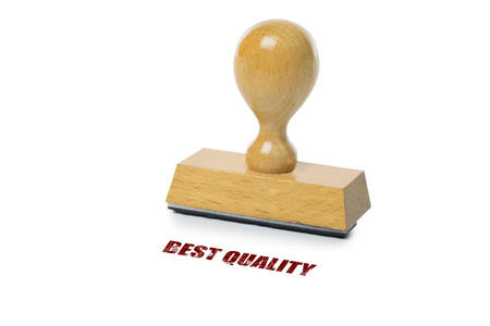 Best Quality printed in red ink with wooden Rubber stamp isolated on white backgroundの写真素材