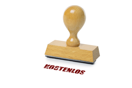 Kostenlos (German Free) printed in red ink with wooden Rubber stamp isolated on white backgroundの写真素材