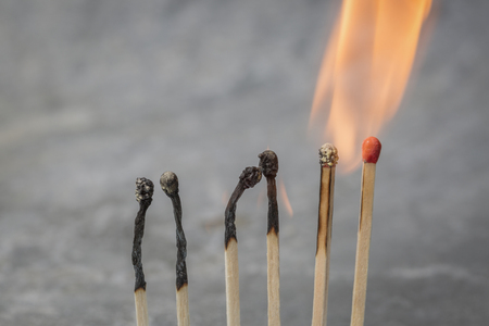 A Row of Matches burning in a chain reaction