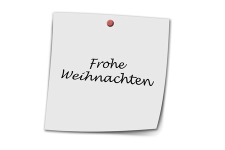 frohe weihnachten (German Merry christmas) written on a memo isolated on whiteの写真素材