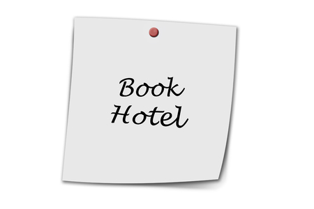 book hotel written on a memo isolated on white backgroundの写真素材
