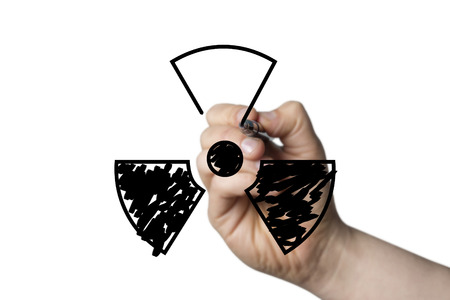 Radio active symbol drawn by a hand isolated on white backgroundの写真素材