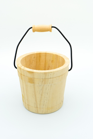 wooden bucket on white background.の写真素材