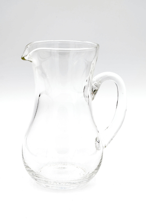 Glass jug isolated on a white backgroundの写真素材