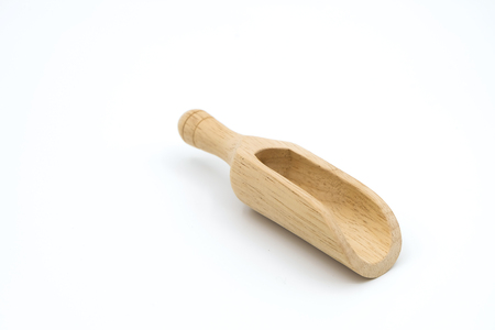 Empty wooden scoop isolated on white background.の写真素材