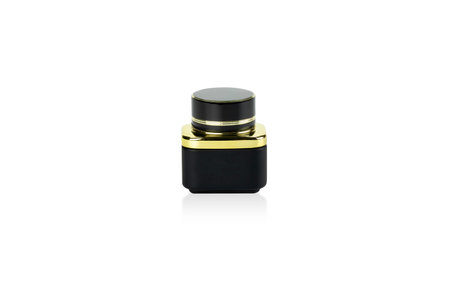 Black and Gold cosmetic cream jars isolated on white background with clipping path.の写真素材