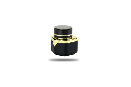 Black and Gold cosmetic cream jars isolated on white background with clipping path.の写真素材