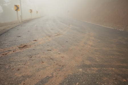 road have fog way uphill mountainの写真素材