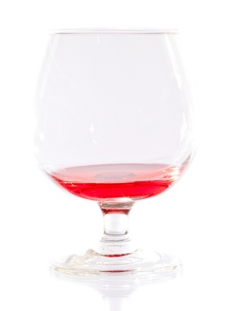 Glass of red wine isolated on white background の写真素材