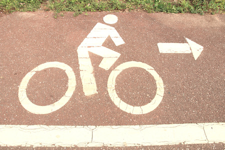 symbol bicycle path out city on the road asphaltの写真素材