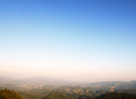 Bright sky at the top of the mountainの写真素材