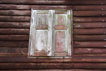 Window of a old wooden cottage の写真素材