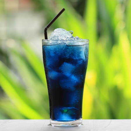 Asian pigeonwings and blue juice の写真素材