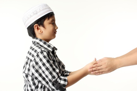 Islamic pray explanation  Asian child showing complete Muslim movements while praying  の写真素材