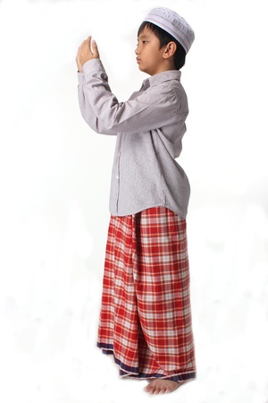 Islamic pray explanation  Asian child showing complete Muslim movements while praying  の写真素材