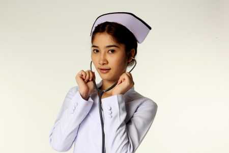 Nurse holding a stethoscope の写真素材