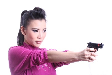 Shoot them up  Asian woman with the gun on her hand  