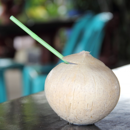 Coconut juice in coconut with strawの写真素材