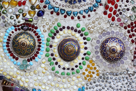 The Thai culture texture of ceramic wall の写真素材