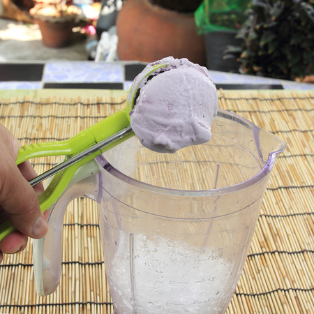 Scoop ice cream put to Blender prepared made Smoothieの写真素材
