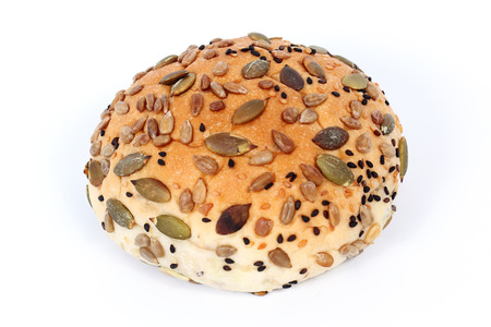 Bread poured by cereal isolate on white backgroundの写真素材