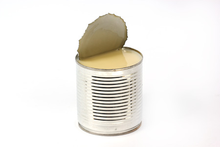 Can of sweetened condensed milk isolate on white background の写真素材
