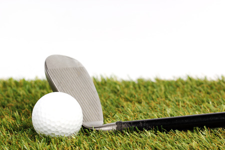 golf club  on the grass isolated white background