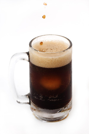 root beer in a large mug isolated on white backgroundの写真素材
