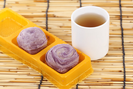 Taro purple bread Chinese style and Hot Teaの写真素材