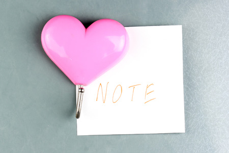 Pink Magnets hearts with ethe note paperの写真素材